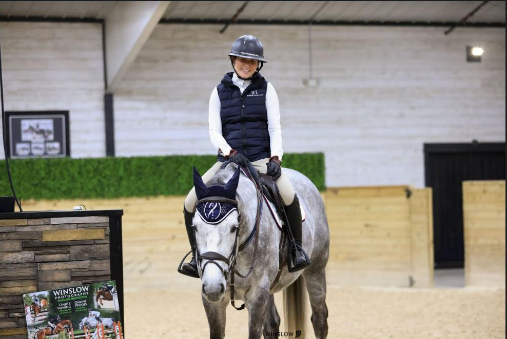 web development and content marketing client content marketing and web development client smiling and sitting on horse